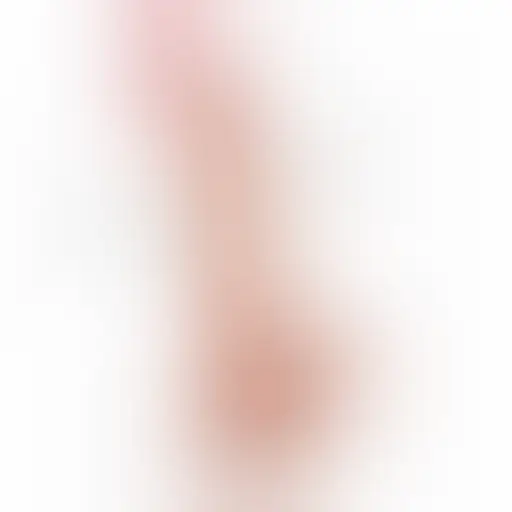 Dildo Lovetoy Sliding Skin z jądrami – 19,5 cm, zakrzywione, cielisty